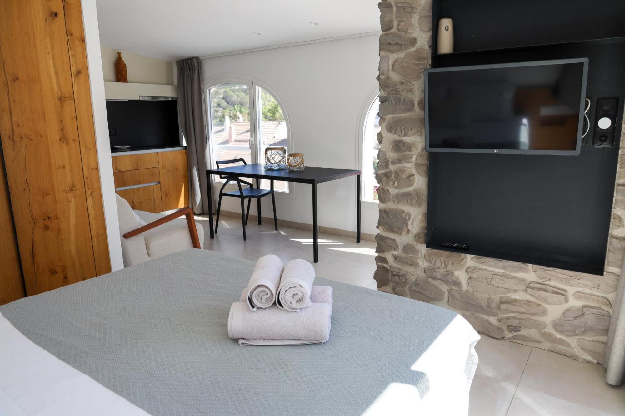 Cala Vadella Beachwalk Suites Phòng bức ảnh